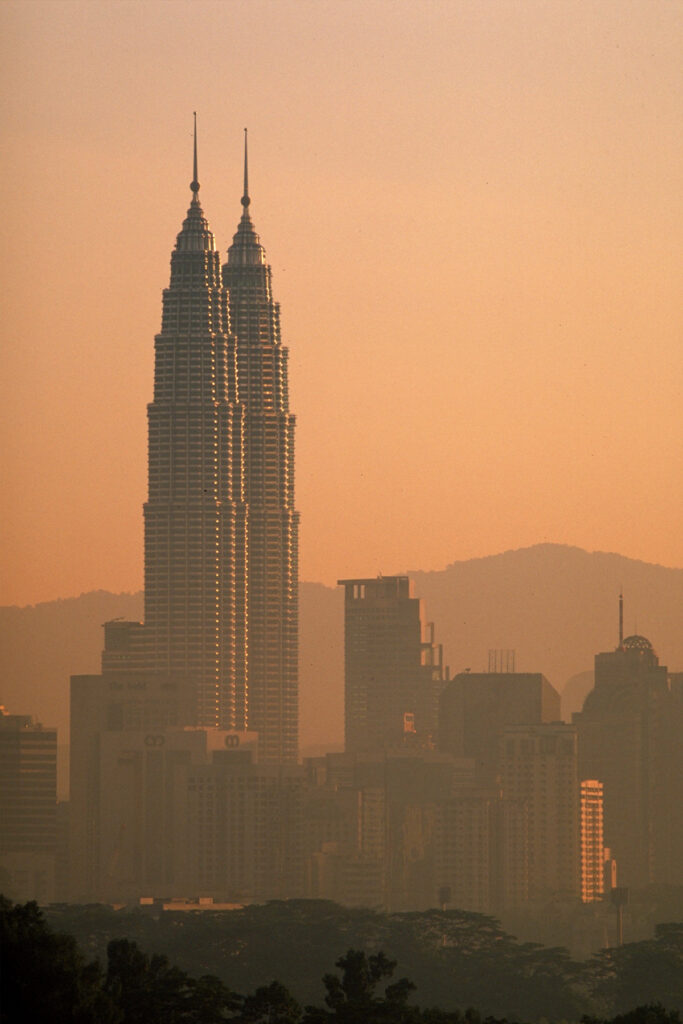 The Petronas Towers and the Kuala Lumpur skyline at dusk. Photo: Pelli Clarke Pelli Architects