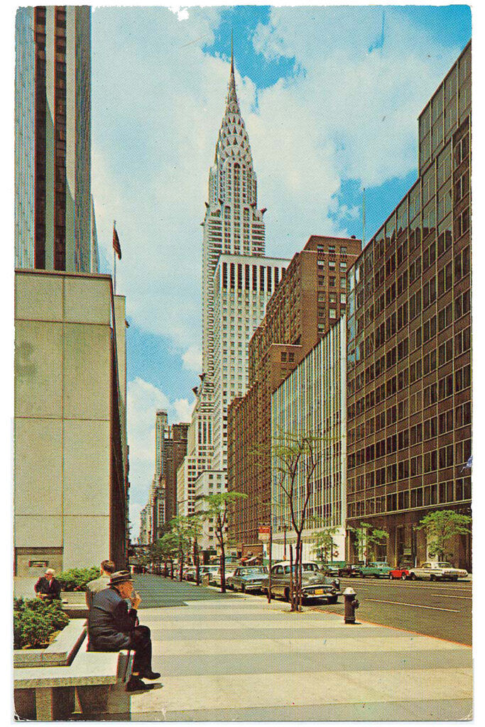 Postcard showing an aerial view of the Chrysler Building as seen from a major Avenue in Manhattan