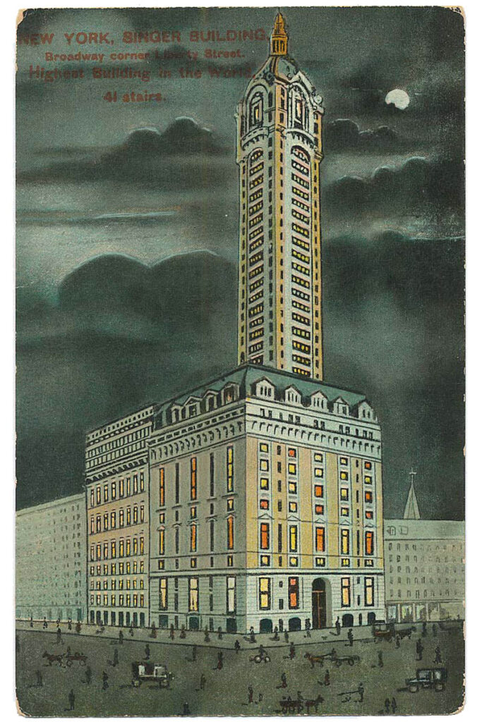 Postcard of Singer Building at night