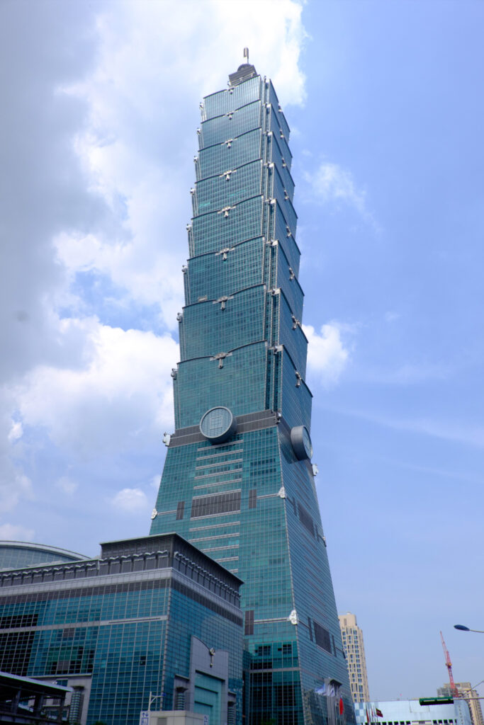 Photograph of Taipei 101 as seen from street level