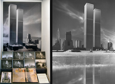 Case view showing a black and white photograph of a scale model of the World Trade Center as seen as from the Hudson River.