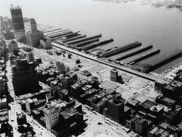 Aerial view of West Street in Lower Manhattan and the North Tower under construction